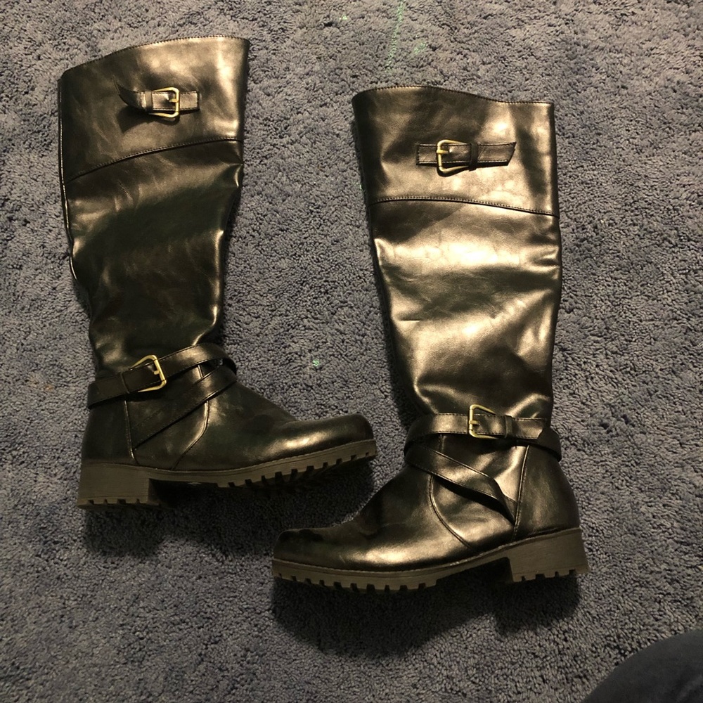 Tall black riding boots